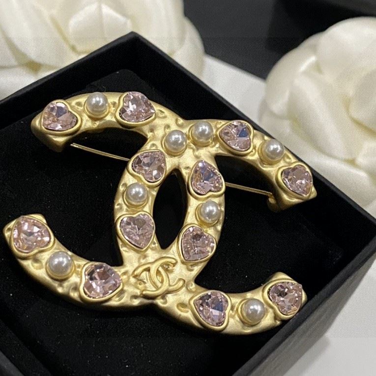 Ch*el brooches